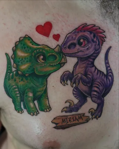 Colour cartoon dinosaurs with love hearts and a name banner on a chest — by Adam Crane at Ministry Ink