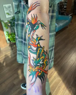 Colour American traditional leg sleeve with flames and flowers — by Chay Menke